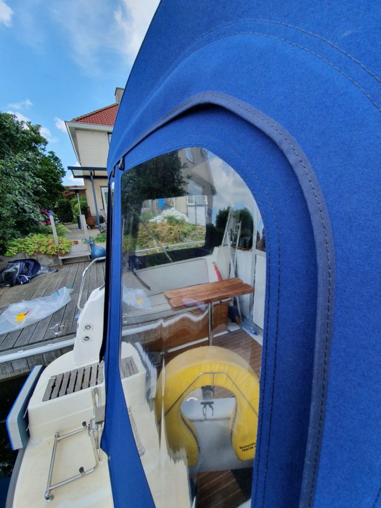 Blue rear tent with windows from side 