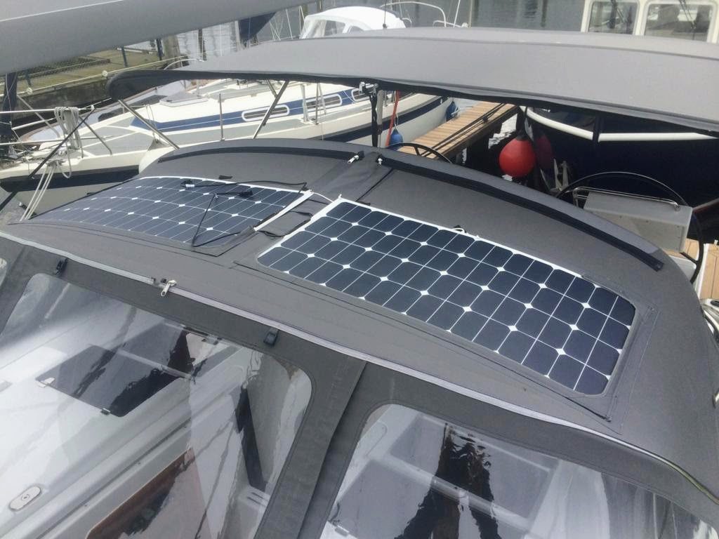 Tube roof with solar panels